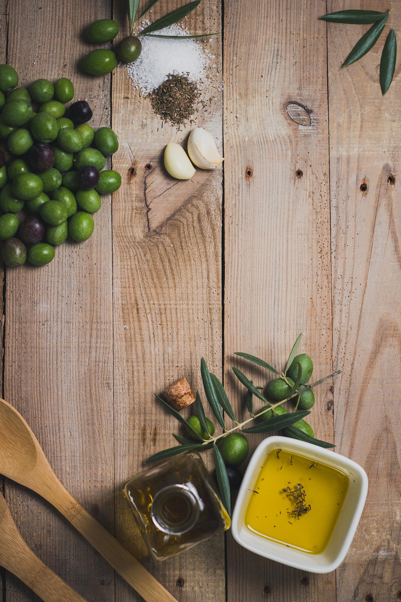 Close detail of herbs and oil